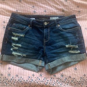 Distressed midi denim shorts